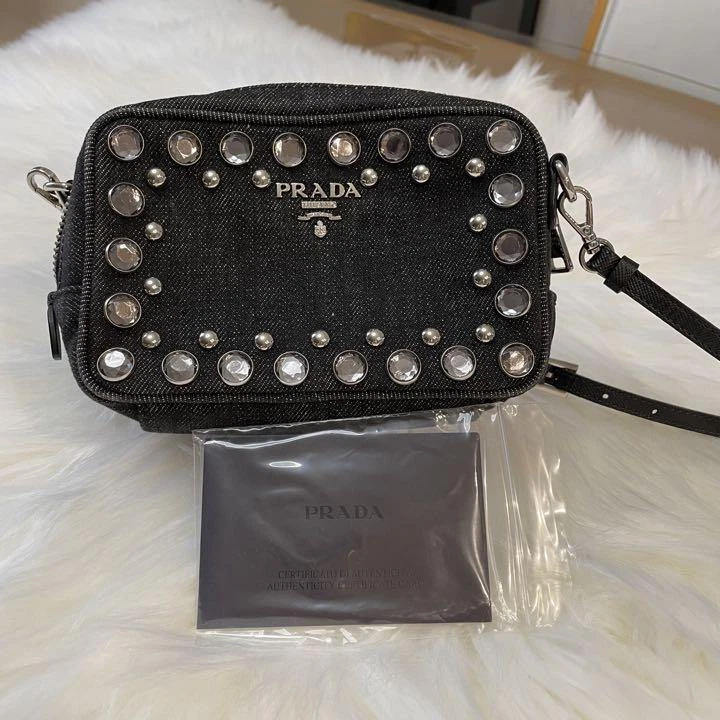 Mini Leather Crossbody Bag in Black - Prada