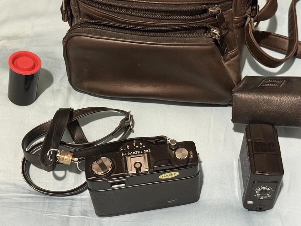 Cámara fotográfica y estuche vintage Minolta Hi-Matic G2 cuerpo negro 35 mm - PROBADA Foto 4 de 4