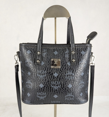 Borsa a tracolla originale MCM in pelle nera con visetti e tela made in Korea