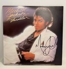MICHAEL JACKSON AUTOGRAPHED THRILLER ALBUM - PSA DNA AND PHOTO PROOF