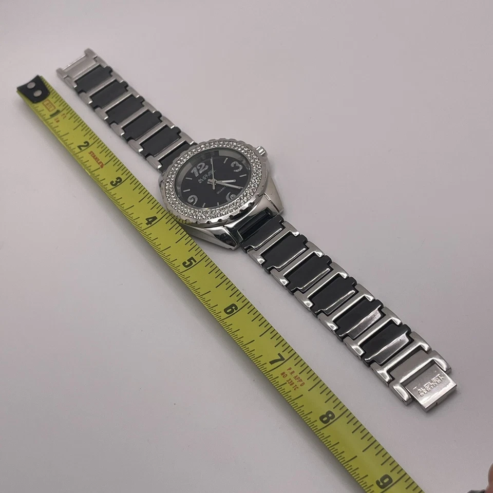 Reloj para mujer August Steiner AS8036BK bisel de cristal eslabón de cerámica tono plateado Foto 2 de 4