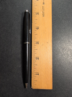 Black Eversharp mechanical pencil with silver tone trim, made in USA, shown beside a wooden ruler for scale.