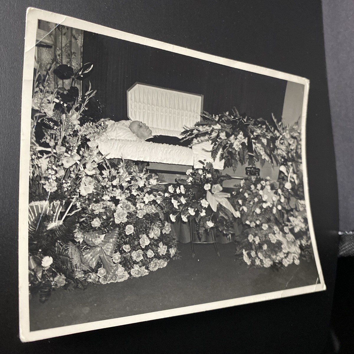 Shirley Temple's funeral, a celebration of her life, featuring an open casket and a mausoleum tour