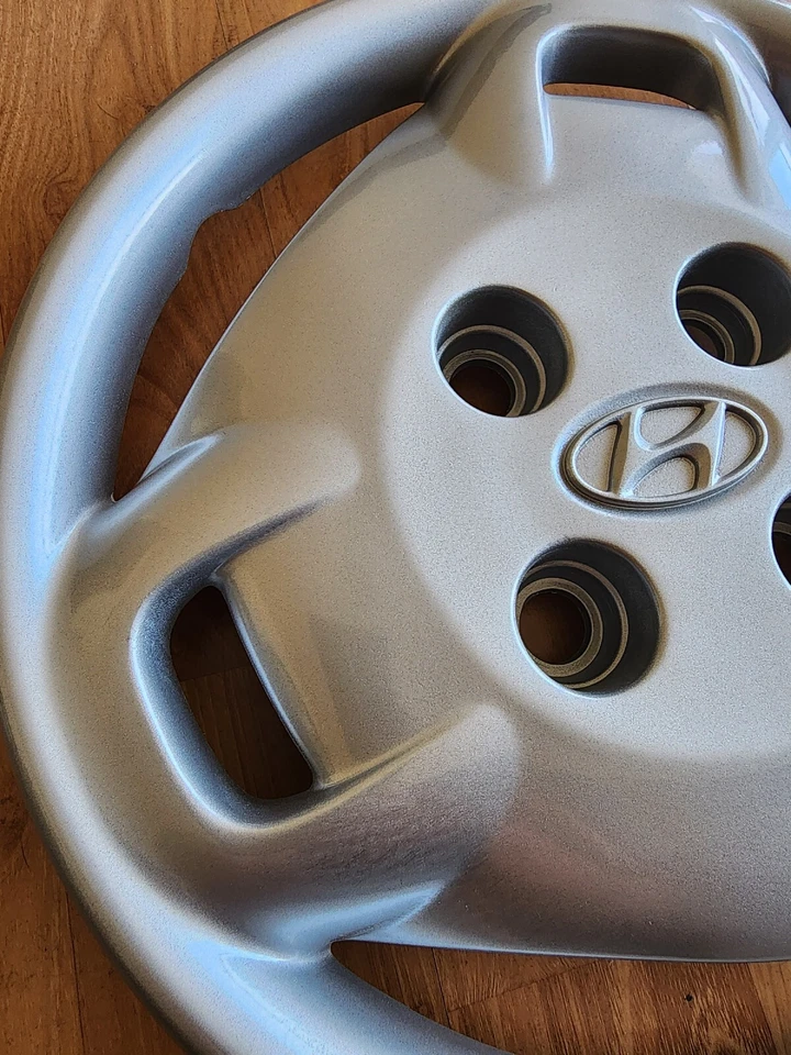 Cubierta de rueda tapacubos Hyundai Elantra 1999-2000 de fábrica de 14" #55544 plateada OEM Foto 2 de 4