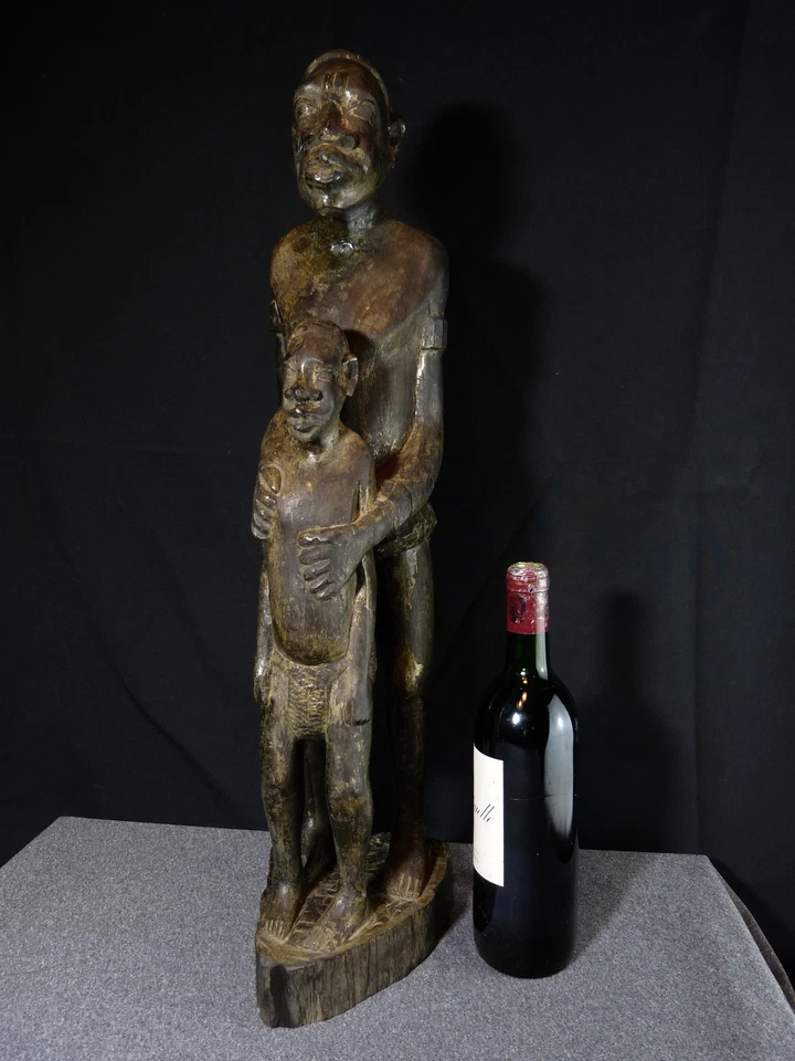 Sculpture statue africaine en bois d'ébène sculpté homme africain Centre Afrique - Photo 3/4