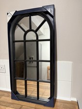 An elegant window-style design Wall Mirror