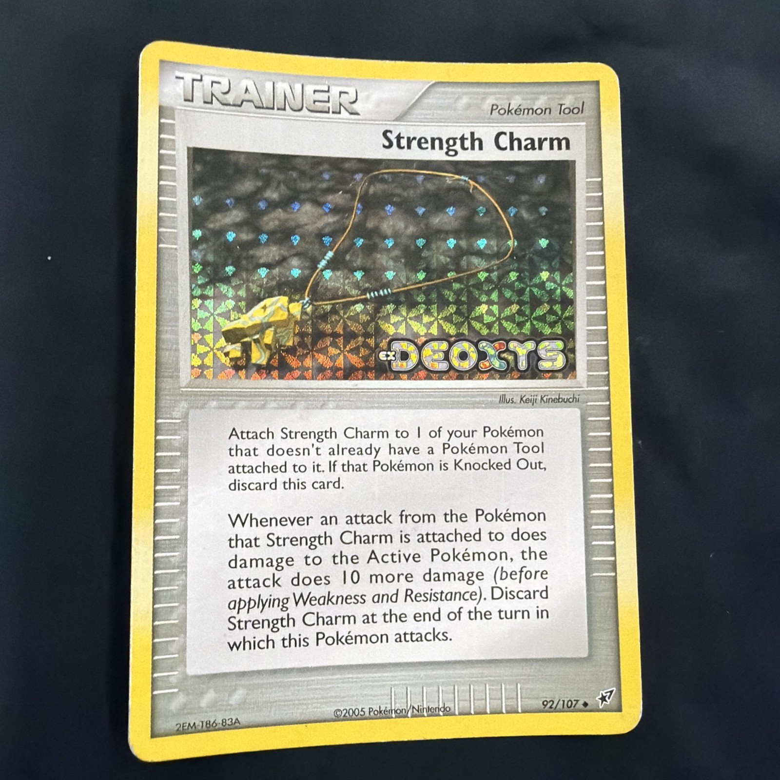 Pokemon Card - Strength Charm Deoxys 92/107 Uncommon Reverse Holo Stamped