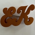 VINTAGE CARVED BUTTERSCOTCH BAKELITE EK MONOGRAM BROOCH — photo 3