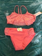 Cat  Jack coral sparkle girls bikini top M and bottom are L coral NWT
