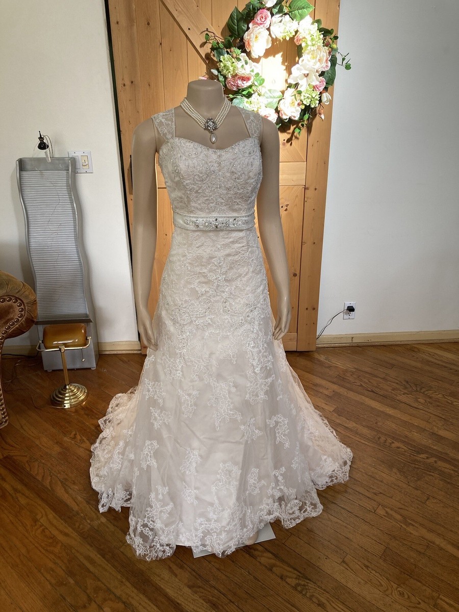 Casablanca Ivory/ Nude Wedding Gown. Size 18 Pre-Loved Casablanca Ivory/ Nude Wedding Gown. Size 18 Pre-Loved