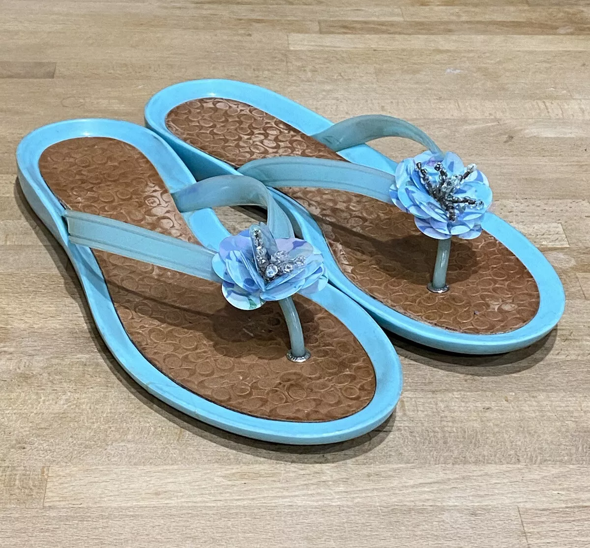 Coach flip hotsell flops with flower
