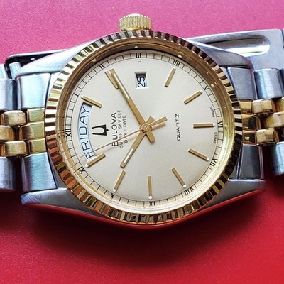 VINTAGE MEN'S BULOVA SUPER SEVILLE QUARTZ QUICK SET DAY/ DATE GOLD