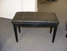 Padded ebony Piano Bench with strong straight legs and storage