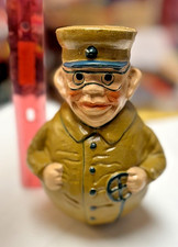 Hucha pintada vintage figurativa de hierro fundido metal ROLY POLY hombre enmascarado chaffeur