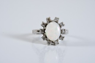 O84A12 Weißgold 585 14kt Ring mit Diamanten zus. ca. 0 10ct & Opal