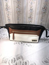 A Itzy Ritzy adjustable Stroller Caddy And Organize  Bag Exterior material￼ 100%