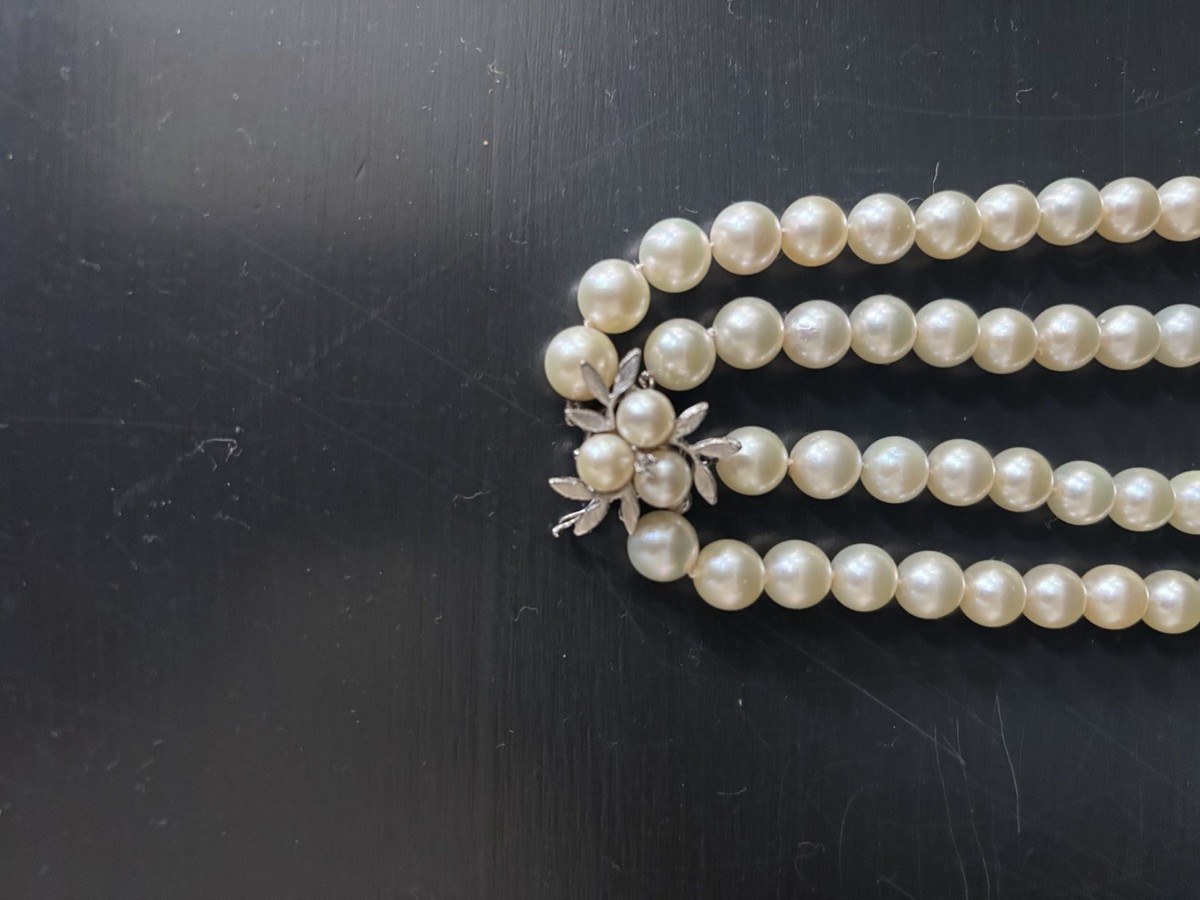 Genuine, Akoya cultured, double strand pearl necklace. White gold