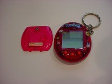 working,original TAMAGOTCHI CONNECTION translucent raspberry sparkle w/TAMA figs