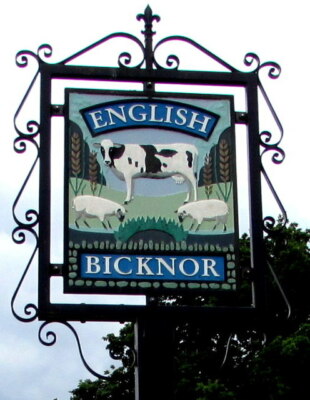 Photo 6x4 English Bicknor village name sign Depicting a cow and two sheep c2016