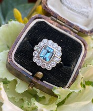 Art Deco 1.8Ct Blue Emerald Cut CZ Flower Halo Engagement Ring in 925 Silver