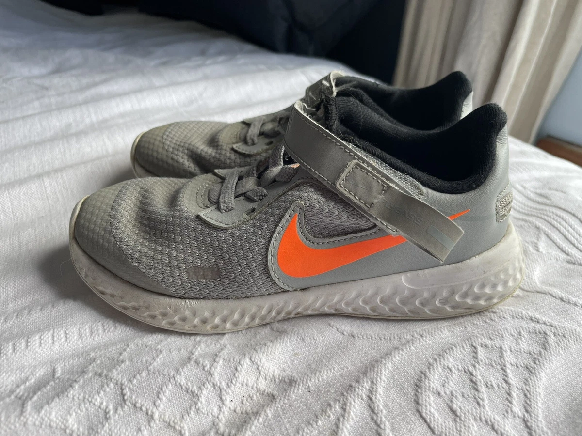 Grey nike sales trainers kids