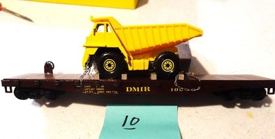 HO SCALE ATHEARN #100 D.M.I.R. FLAT CAR WITH ORE TRUCK.  (10)