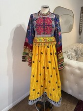 Vibrant multi-coloured Afghan dress with yellow and blue hues