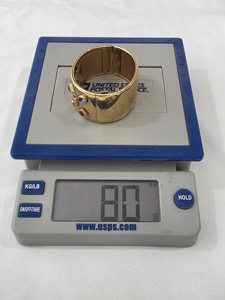 Reloj suizo pequeño The Franklin Mint tono dorado puño ancho pedrería para mujer Foto 2 de 4