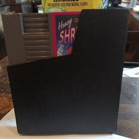 Nintendo NES Heavy Shreddin' game cartridge with manual