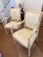 Two chairs for living or dining room, modern but classic French style.