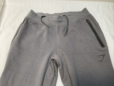 Gymshark Small Grey Pants With Zipper On The Pockets And Zippers At The Ankles
