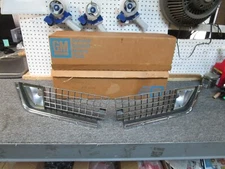 71 corvette die cast chrome plated front grille housings NOS GM 5964683 684