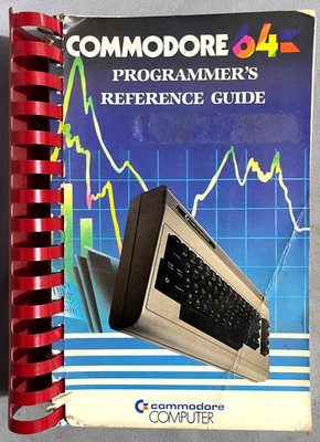 Red Plastic Commodore 64 Programmers Reference Guide CBM 1984 used worn a bit