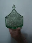 Green depression glass dish with American Eagle and star