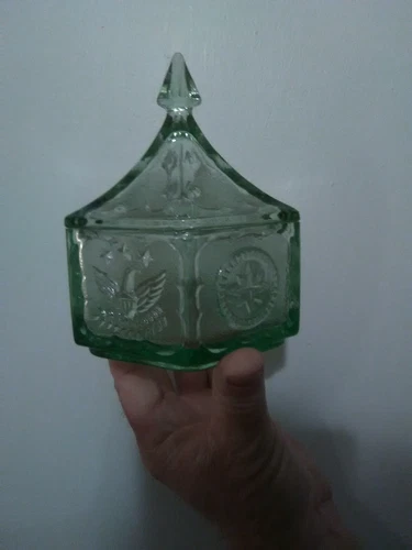 Green depression glass dish with American Eagle and star