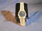 Seiko 7N43-8111  Black Dial Gold Tone Quartz Watch 27mm. Needs Battery. Mint