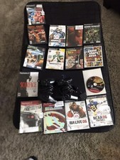 Sony PlayStation 2 Console - Black With Games And Two Controllers