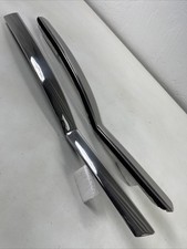 1955-57 Chevrolet Convertible L&R rear quarter belt moldings very nice