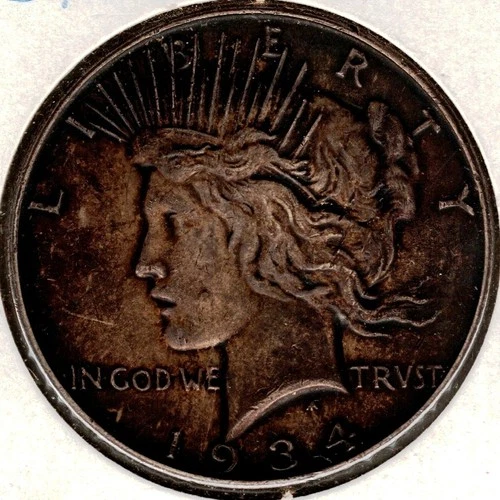 1934-D Peace Silver Dollar, Dark Toning Apparent XF to AU Grade.Nice! See photos
