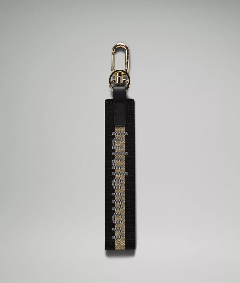 Lululemon 🖤 Black & Metallic Gold Never Lost Wordmark Logo