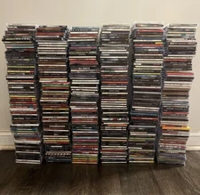 Estate lot 2 clearance of music CDs, all disks are the same price. great variety