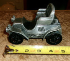unbranded 1902 metal rambler car coin bank in good shape used — photo 1