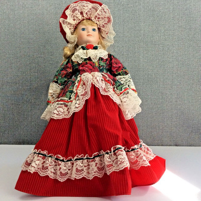 Holiday Christmas themed Doll Porcelain 16'' tall Red Suede laced Dress & Bonnet