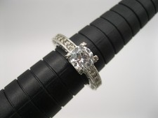 Lovely Vintage CZ Ring Engagement, cocktail, sz 6 14 sm and 1 larger ctr. stone