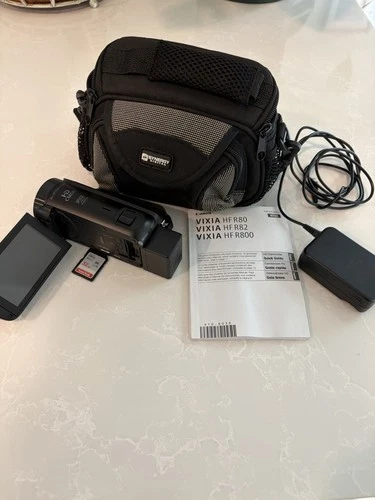 Canon VIXIA HF R800 w/Battery, OEM Charger, 32GB SD Card, Bag, and Mic - product listing photo