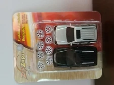 ZIPZAPS Zip Zaps SE Cadillac Escalade Body Kit 2 bodies & 2 sets of wheels MUSIC