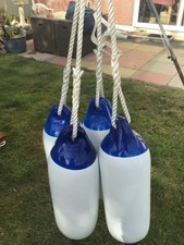 Boat fenders size30 ins x 10 ins blue + white with spliced on lines new & unused