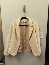 never worn cream colored blazer. No button. Standard fit. Business casual style
