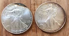 LOT OF 2 SILVER EAGLE COINS, 2002, 2014 WITH TONING