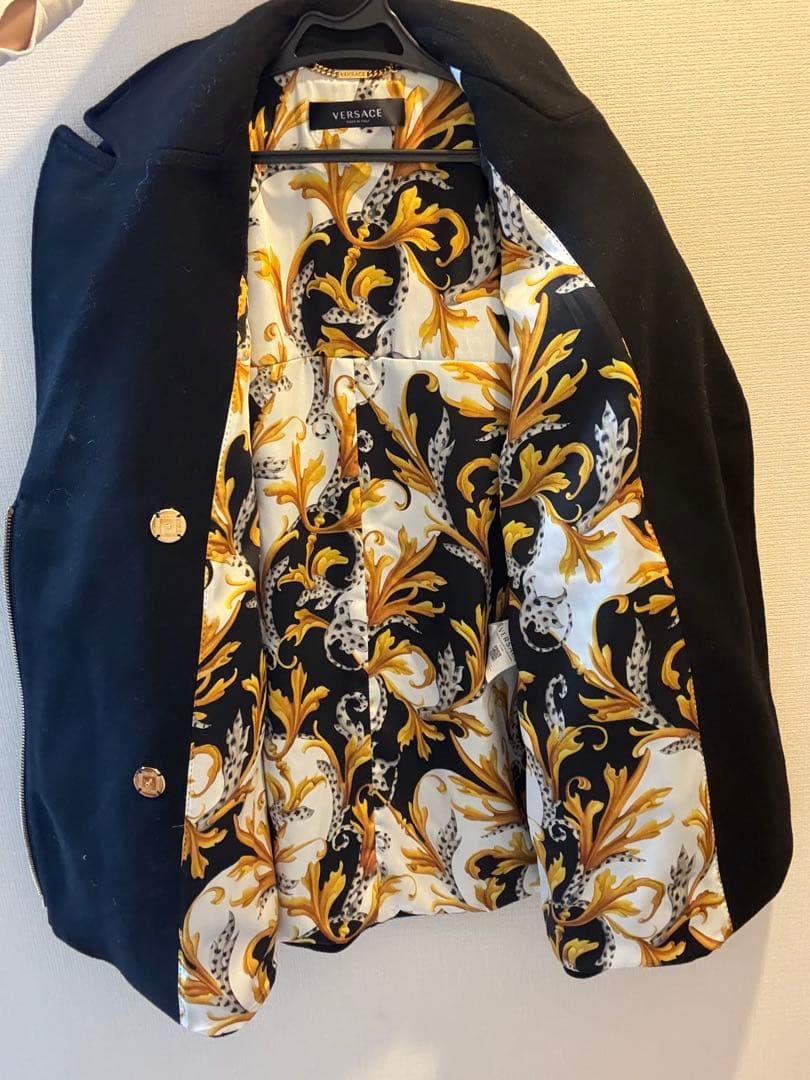 USED VERSACE WOMEN'S COAT WITH BAROQUE LINING GOOD